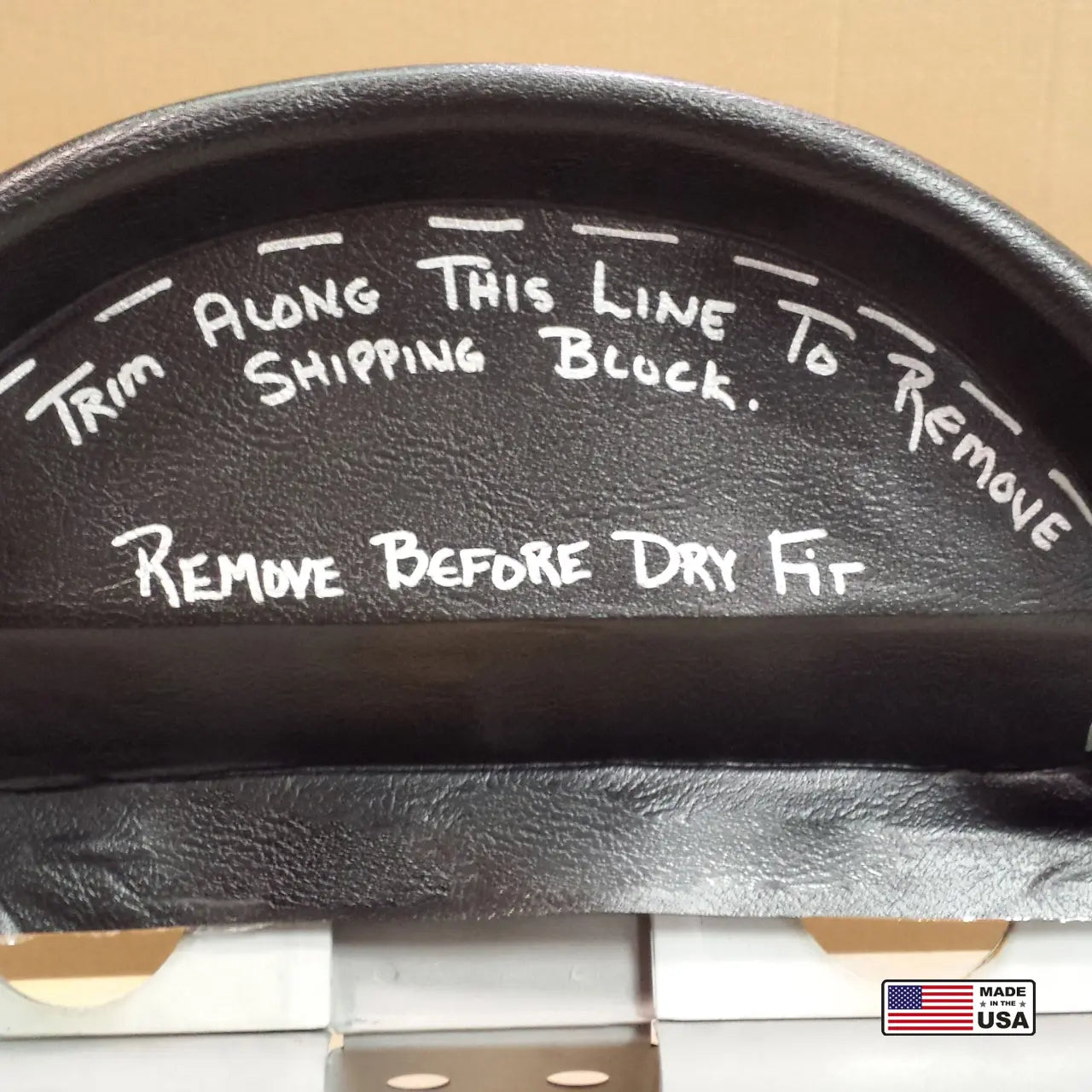 Trimming direction and close-up of UV-resistant Madrid grain vinyl on a 1956 Ford Safety Package dash pad