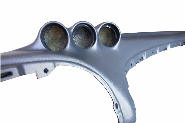 Dodge Ram dashboard pad detail showing gauge pod openings and contours