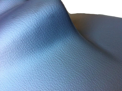Dodge Ram dash pad vinyl grain texture close-up with textured finish