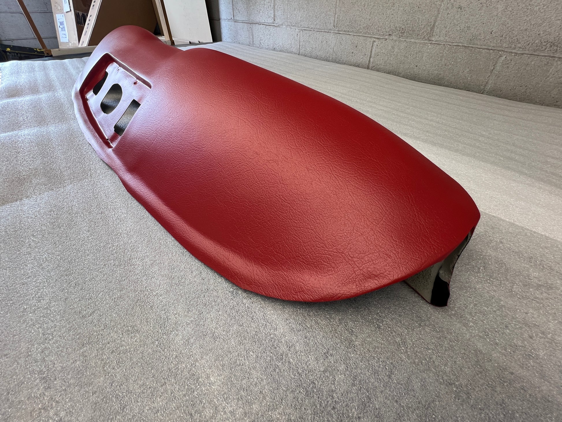 Close-up of Just Dashes custom dyed 1960-1963 Ranchero Dash Pad in period-correct red